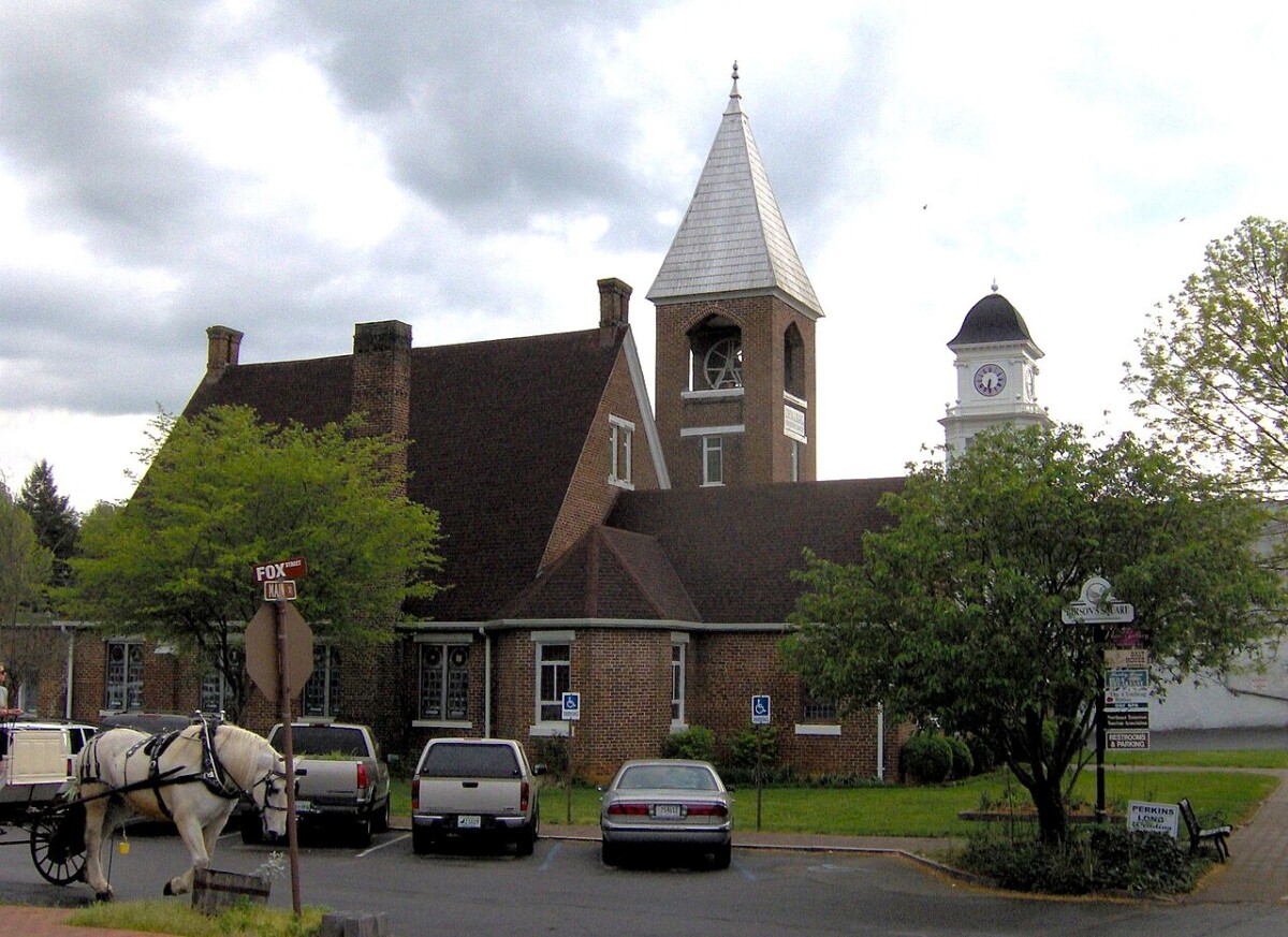 A historic church tower rising over Main Street in the Jonesborough, Tennessee historic district