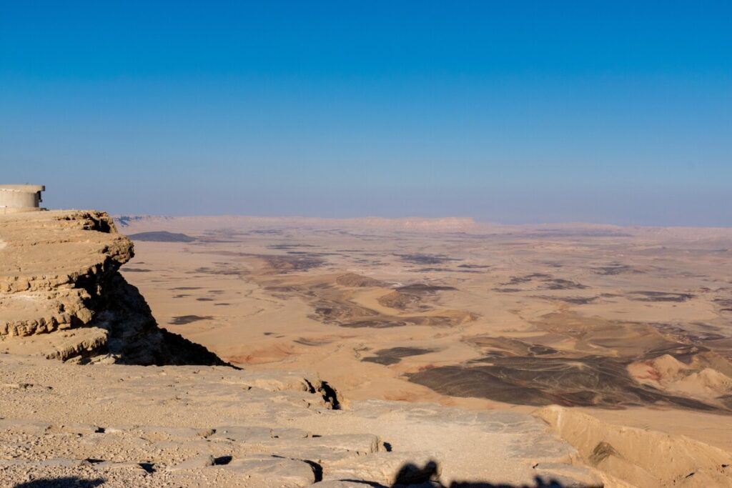 Mitzpe Ramon Crater with black rocks Mitzpe Ramon
